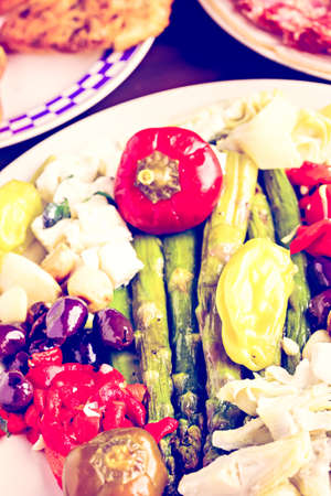 Appetizers plate with vegetarian antipasto in Italian restaurant.の写真素材