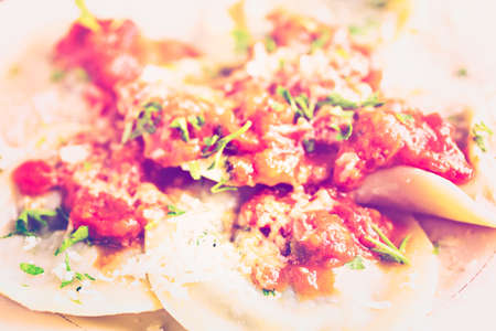 Fresh Italian gradmas raviolis on the table in Italian restaurant.の写真素材