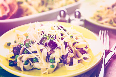 Fresh fettuccine with creamy mushroom sauce.の写真素材