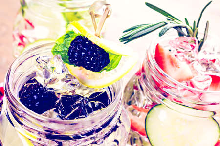 Fresh infused water made with organic ccitruses and berries.の写真素材