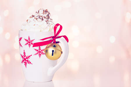 Hot chocolate garnished with whipped cream and chocolate shavings.の写真素材