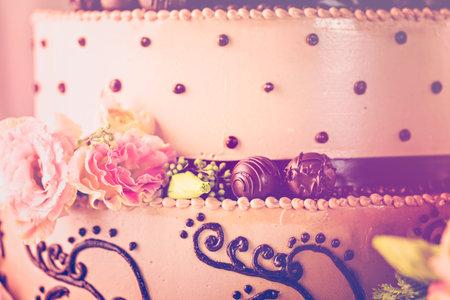 Gourmet tiered wedding cake at wedding reception.の写真素材