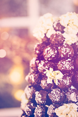 Gourmet truffle cone wedding cake at wedding reception.の写真素材