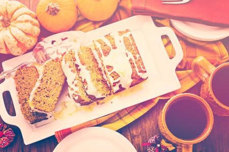 Homemade pumpkin bread with orange glazing on top.の写真素材