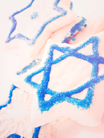 Gourmet cookies decorated with white icing for Hanukkah.の写真素材