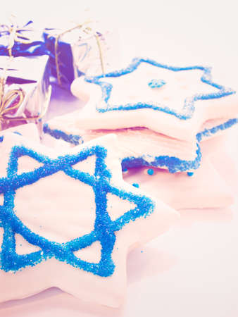 Gourmet cookies decorated with white icing for Hanukkah.の写真素材
