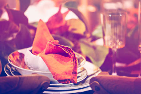 Elegant table prepared for Thanksgiving dinner with family and friends.の写真素材