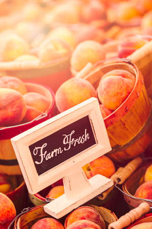 Fresh organic produce on sale at the local farmers market.の写真素材