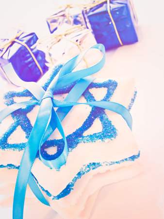 Gourmet cookies decorated with white icing for Hanukkah.の写真素材