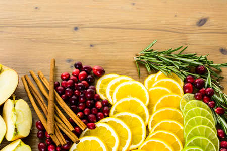 Sliced fresh organic food ready for preparing winter sangria.の写真素材