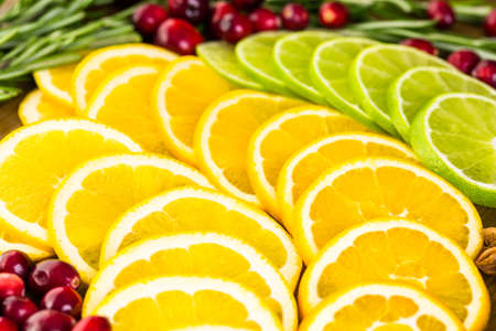 Sliced fresh organic food ready for preparing winter sangria.の写真素材