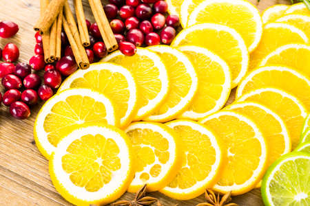 Sliced fresh organic food ready for preparing winter sangria.の写真素材