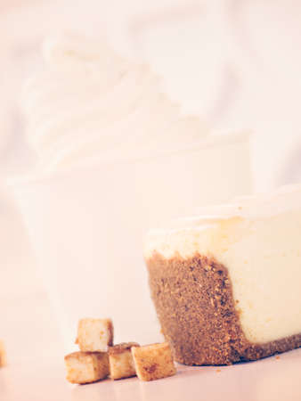 Cup of cheesecake frozen yogurt or soft serve ice cream.の写真素材