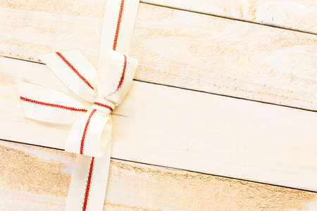 Classic bow made of wide white ribbon.の写真素材