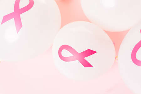 White latex balloos with pink reibbons.の写真素材