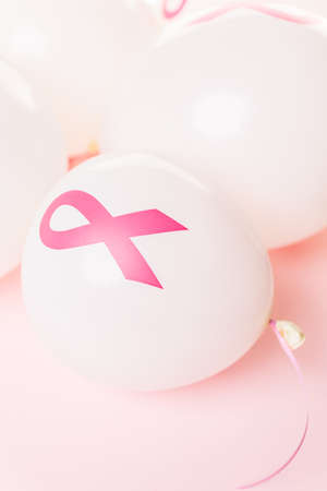 White latex balloos with pink reibbons.の写真素材