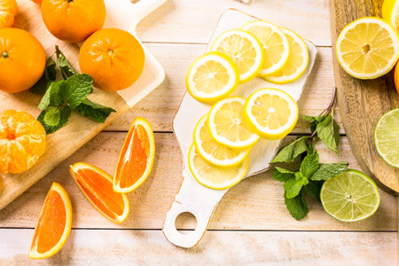 Variety of citrus fruit including lemons, lines, grapefruits and oranges.
