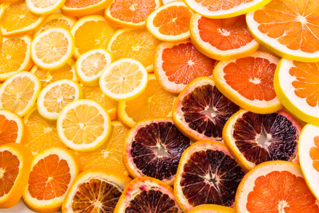 Variety of citrus fruit including lemons, lines, grapefruits and oranges.