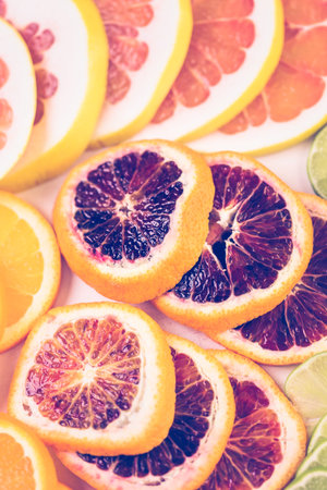 Variety of citrus fruit including lemons, lines, grapefruits and oranges.
