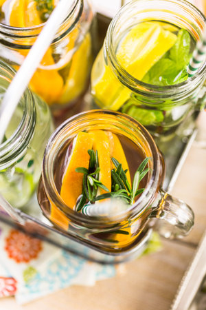 Detox citrus infused water as a refreshing summer drink.の写真素材