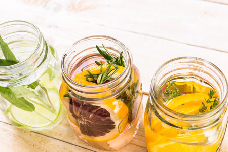 Detox citrus infused water as a refreshing summer drink.の写真素材