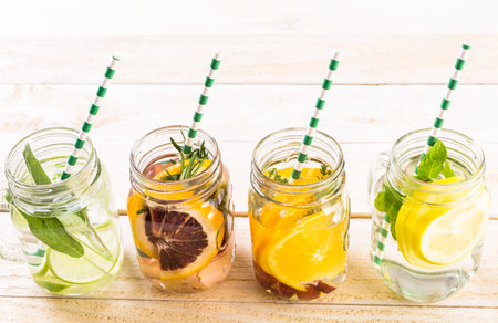 Detox citrus infused water as a refreshing summer drink.の写真素材