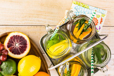 Detox citrus infused water as a refreshing summer drink.の写真素材