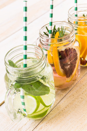 Detox citrus infused water as a refreshing summer drink.の写真素材