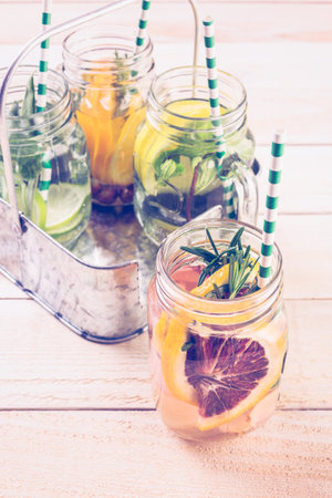 Detox citrus infused water as a refreshing summer drink.の写真素材