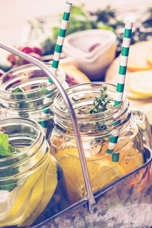 Detox citrus infused water as a refreshing summer drink.の写真素材