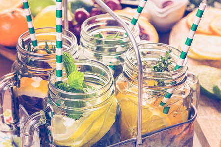 Detox citrus infused water as a refreshing summer drink.の写真素材