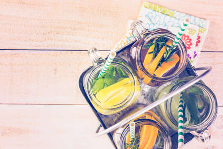 Detox citrus infused water as a refreshing summer drink.の写真素材