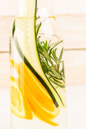 Detox citrus infused water as a refreshing summer drink.の写真素材