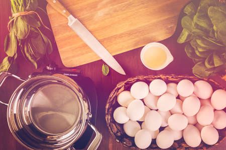 Dyeing Easter eggs with natural dye from spinach.の写真素材