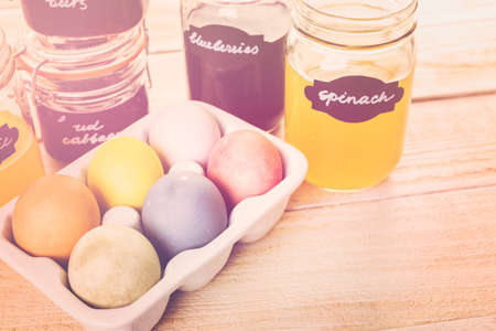 Easter eggs painted with natural egg dye from fruits and vegetables.の写真素材