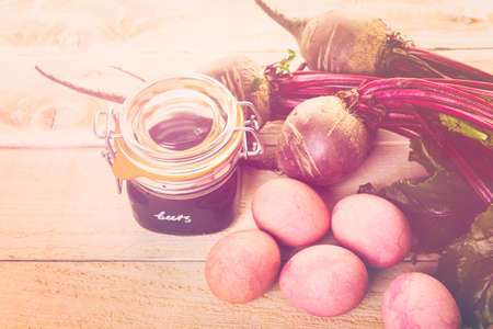 Easter eggs painted with natural egg dye from fruits and vegetables.の写真素材
