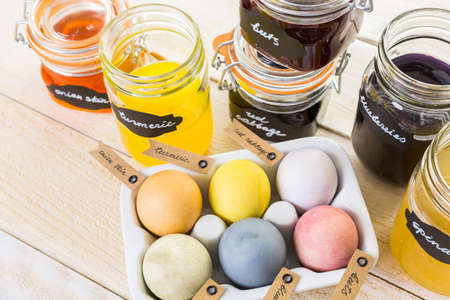 Easter eggs painted with natural egg dye from fruits and vegetables.の写真素材