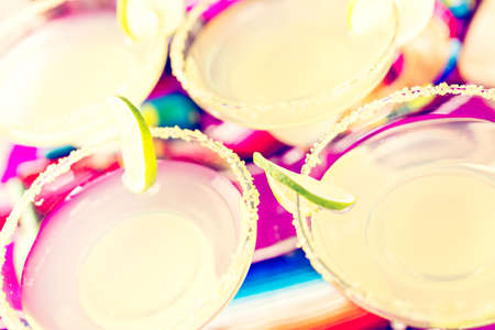 Classic lime margarita with garnish lime and turbinado sugarの写真素材