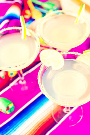 Classic lime margarita with garnish lime and turbinado sugarの写真素材