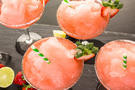 Frozen strawberry margarita cocktail in margarita glass.の写真素材