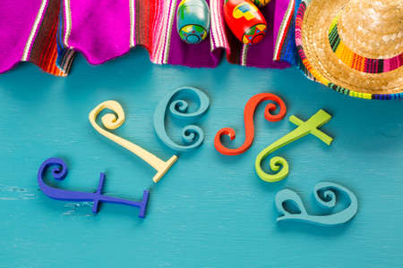 Traditional colorful table decorations for celebrating Fiesta.の写真素材