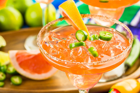Spicy grapefruit margarita on ice in margarita glass.の写真素材