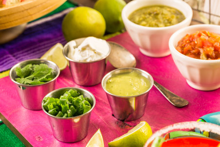 Party table with tamales, strawberry margartisa and pan dulche bread.の写真素材
