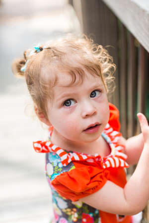 Toddler girl in the park.の写真素材