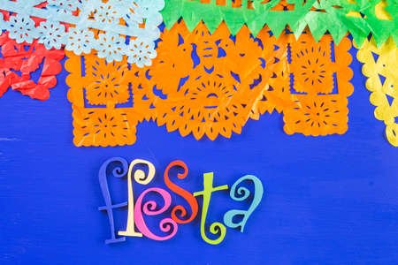 Traditional colorful table decorations for celebrating Fiesta.の写真素材