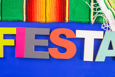 Traditional colorful table decorations for celebrating Fiesta.の写真素材