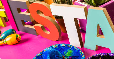 Traditional colorful table decorations for celebrating Fiesta.の写真素材