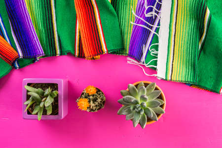 Traditional colorful table decorations for celebrating Fiesta.の写真素材