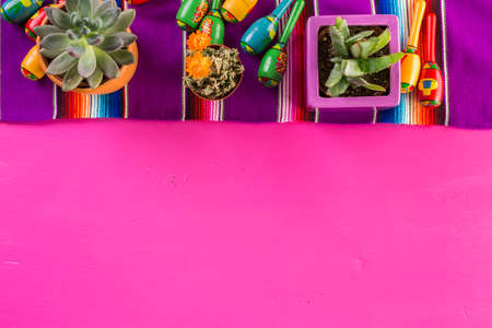 Traditional colorful table decorations for celebrating Fiesta.の写真素材