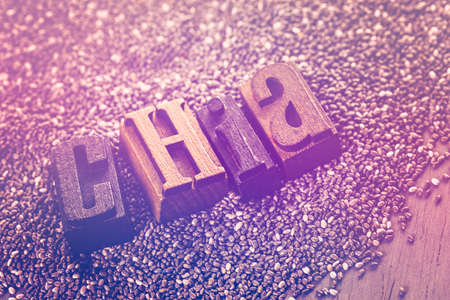 Healthy Chia seeds with chia wooden sign close-up.の写真素材